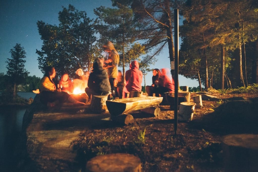 Singing around campfire