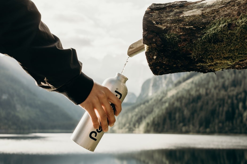 Drink Water From Natural Water Source While Camping
