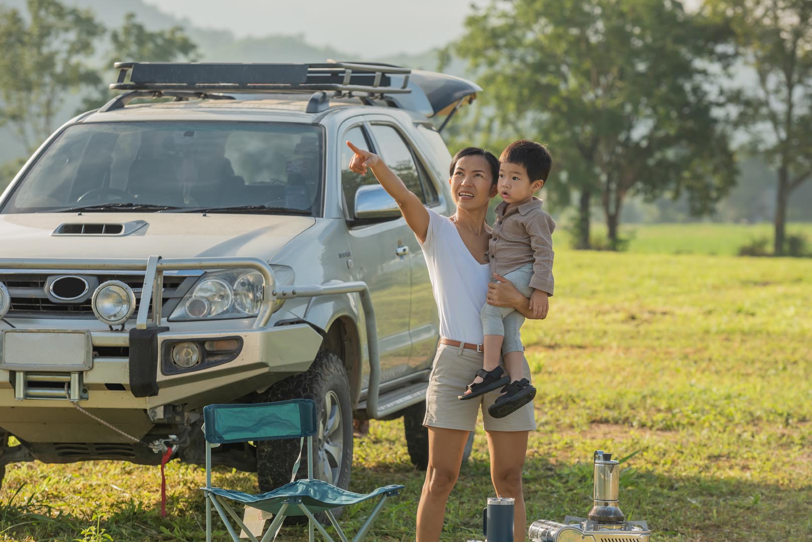 Camping with kids happy mother son with spending time outdoor autumn park