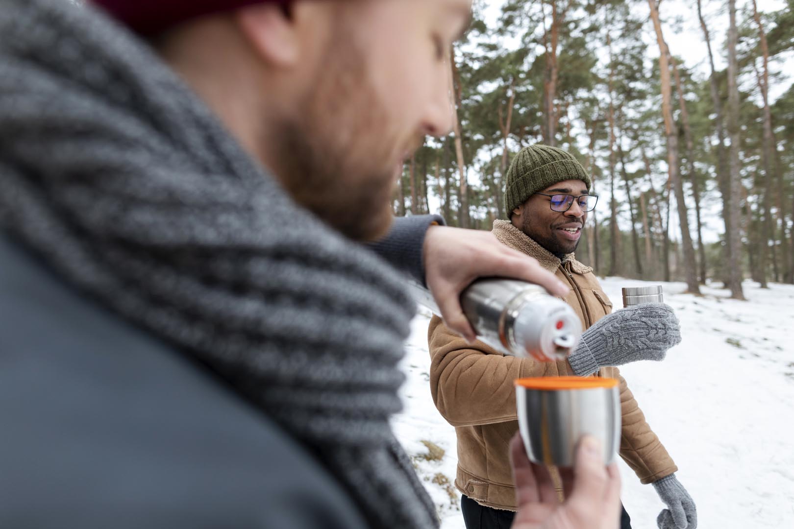 Friends with hot drinks winter season
