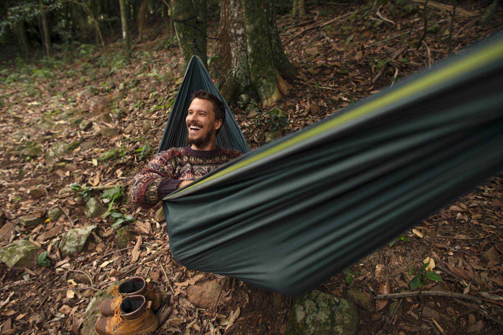 Full shot adventurous man bivouacking