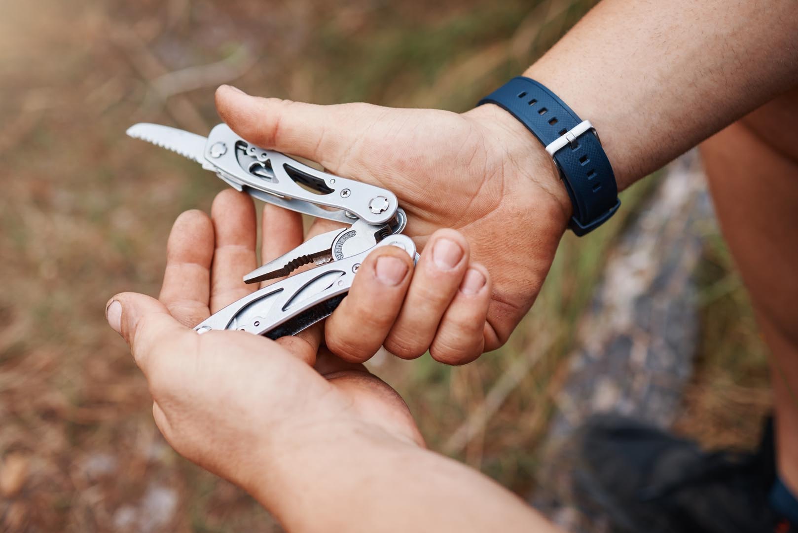 Hands man multi purpose knife environment camping land sustainability forest woods hiking
