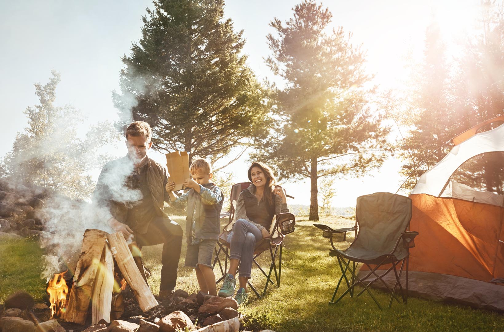 Outdoor fire child camping with parents forest vacation holiday adventure nature travel