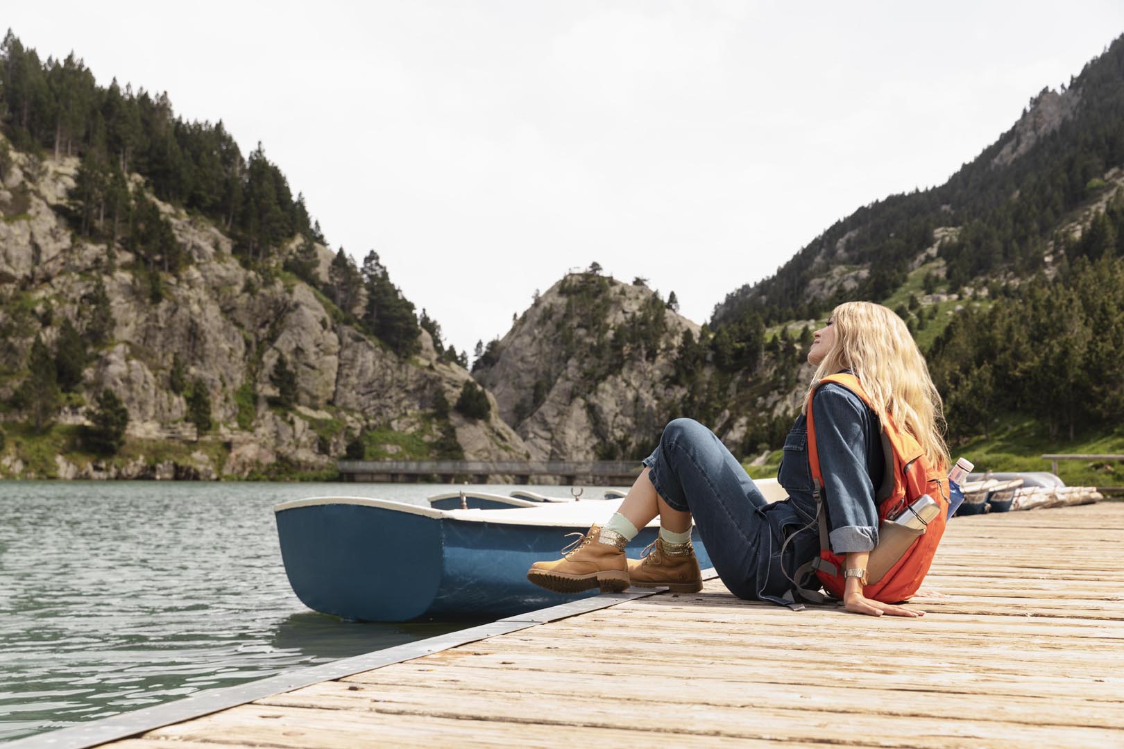 Young beautiful woman traveling mountains